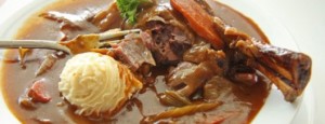 Cordero con verduras confitadas