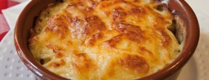 Bacalao gratinado con col